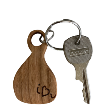 Picture of handmade cherry wood keychain and key