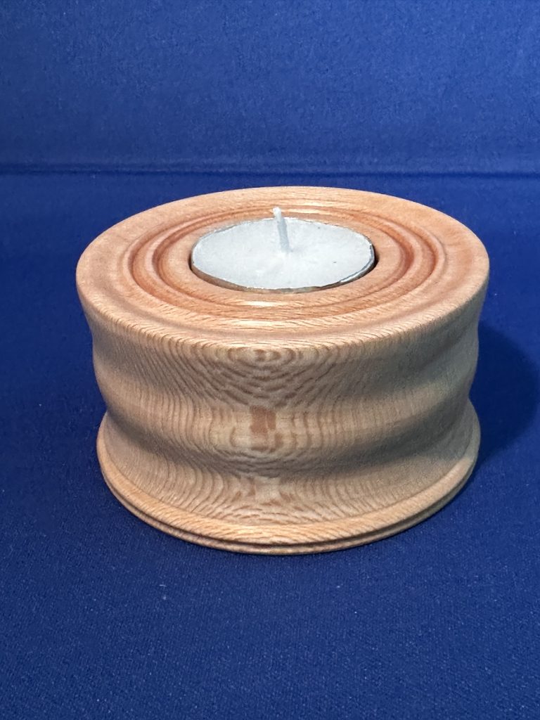 Tea Candle Holder made from Sycamore wood. This measures 3-1/4" Wide x 1-3/4" Tall