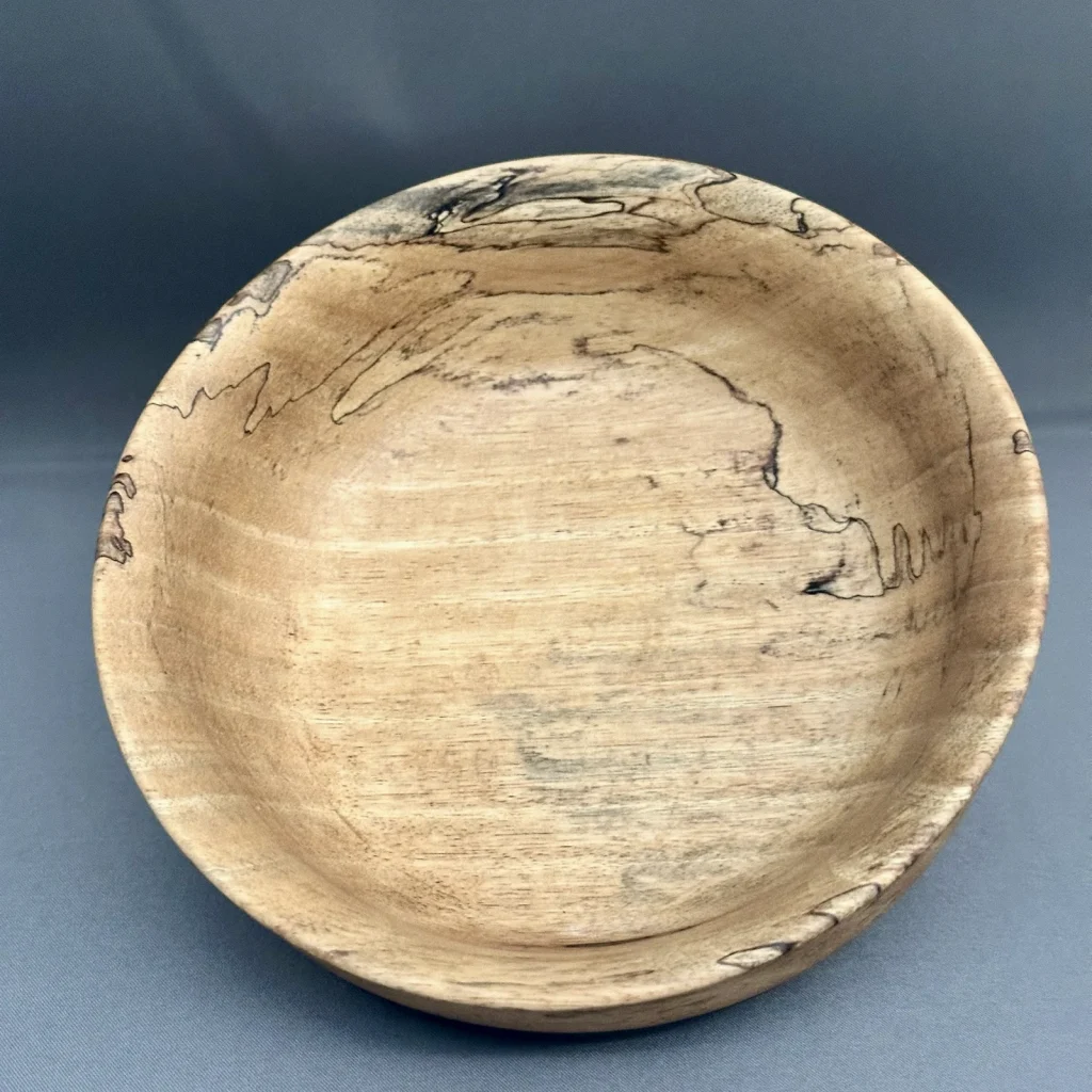 Hand-turned Spalted Tamarind wood bowl with distinctive dark spalt lines