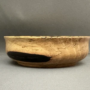Side profile of Spalted Tamarind bowl with contrasting dark natural wood coloration