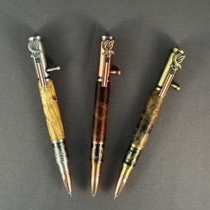 Three handcrafted Bald Eagle bolt-action pens shown straight on