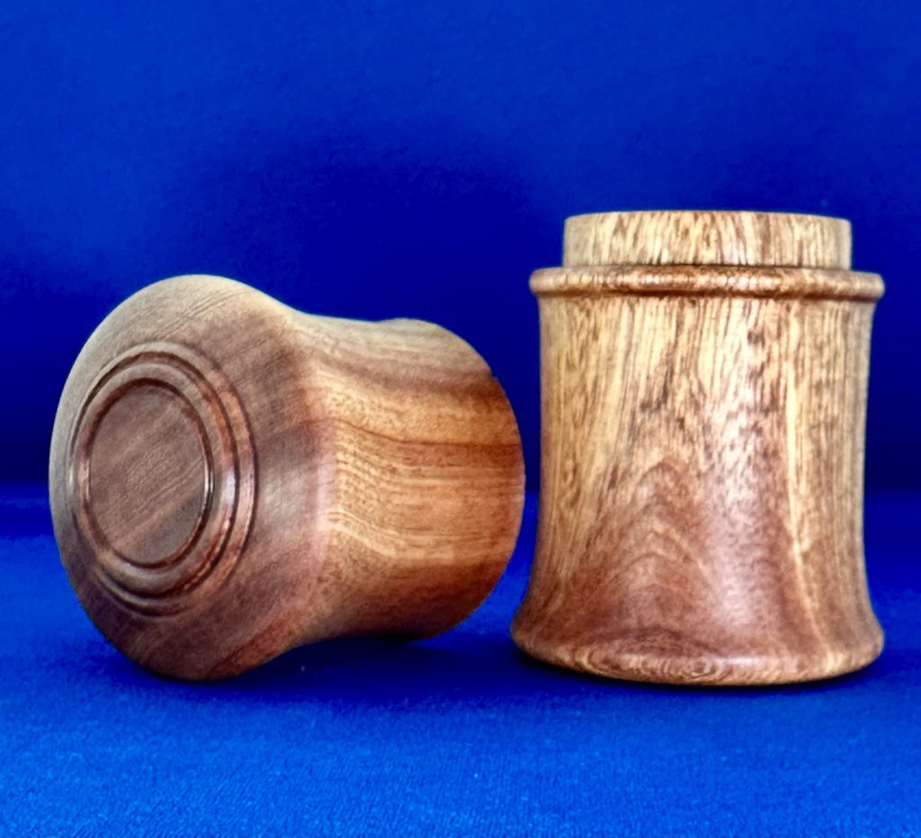 Handcrafted turned wooden box top and bottom.