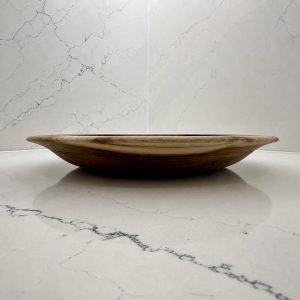Side profile of Horizon Within showing its shallow form and gently flared rim.