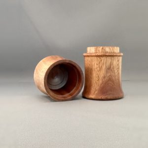 Open Sipo mahogany keepsake box with the hollow interior of the lid visible
