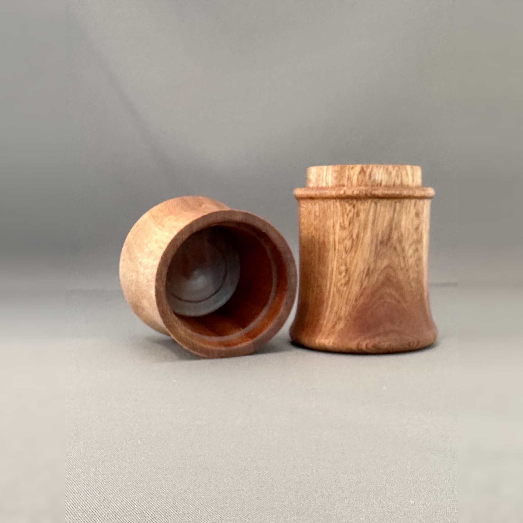 Open Sipo mahogany keepsake box with the hollow interior of the lid visible