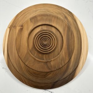 Underside of Horizon Within with concentric decorative rings turned into the rainbow poplar.