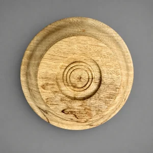 Underside of hand-turned Curly White Limba bowl showing foot and wood grain