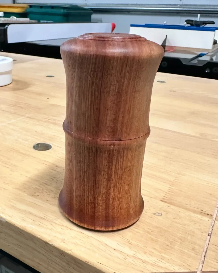 Inner Sanctuary, a Sipo mahogany keepsake box with a fitted lid, standing on the workshop bench.